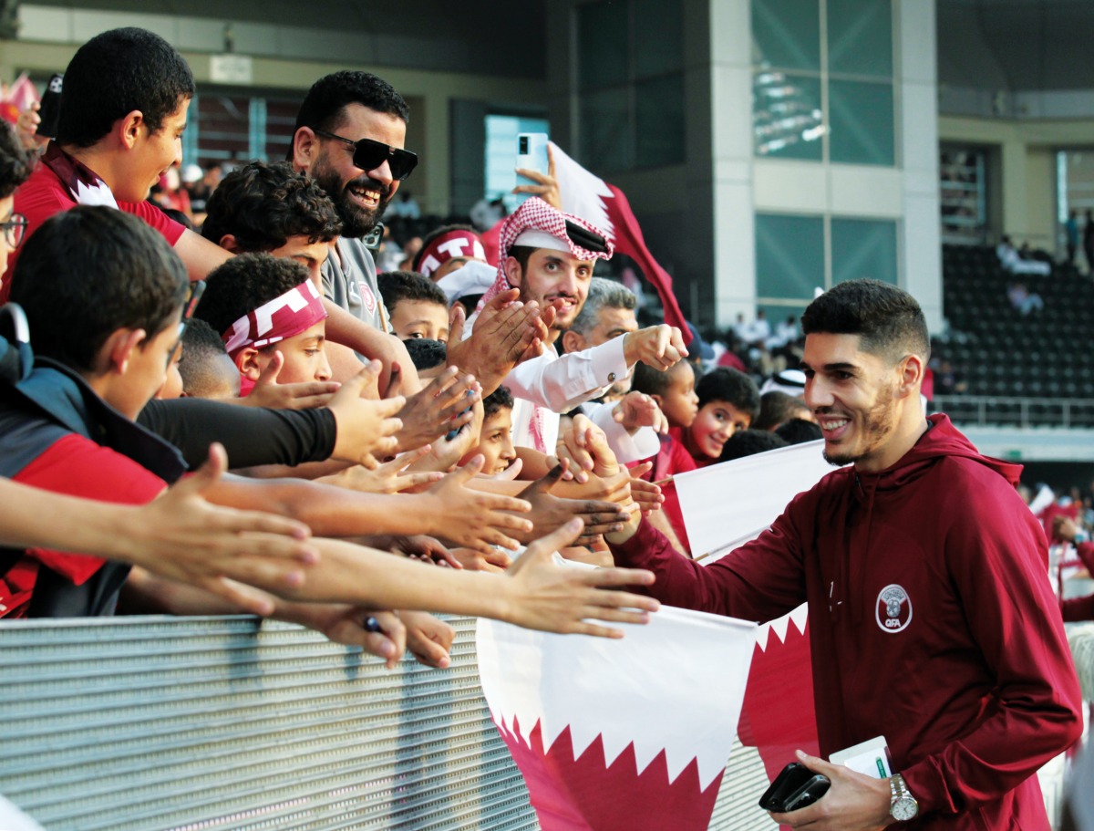 Qatar's Karim Boudiaf signs autographs for fans. Pics: Salim Matramkot