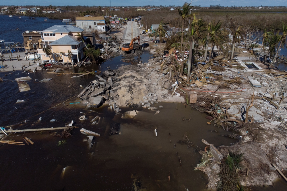 A view of the destroyed road between Matlacha and Pine Island after Hurricane Ian caused widespread destruction in Matlacha, Florida, U.S., October 2, 2022. REUTERS/Marco Bello