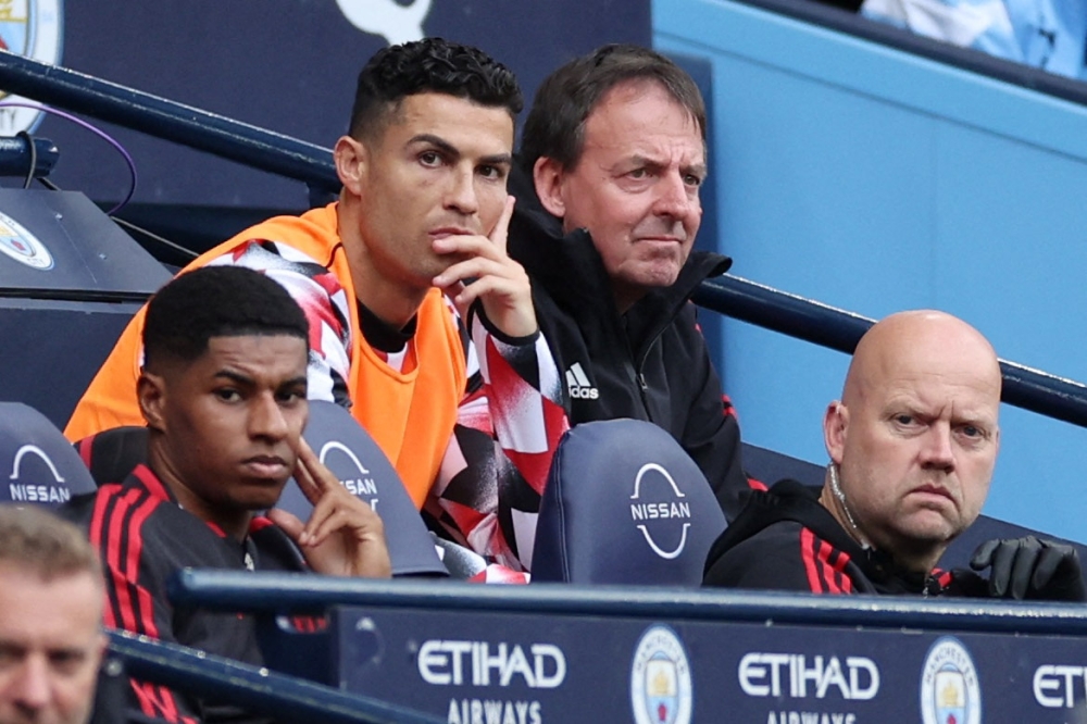 Manchester United's Cristiano Ronaldo is seen on the substitutes bench during the match against Manchester City at the Etihad Stadium in Manchester on October 2, 2022.  Action Images via Reuters/Carl Recine 