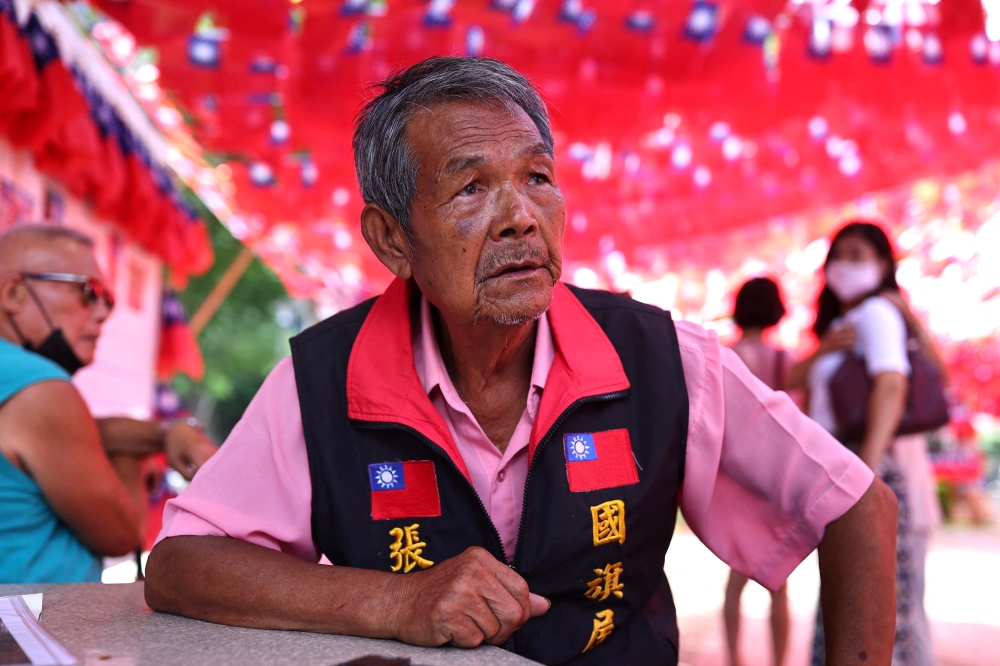 Chang Lao-wang speaks to Reuters at the park he decorates with Taiwanese flags ahead of Taiwan National Day in Taoyuan, Taiwan, October 5, 2022. Reuters/Ann Wang