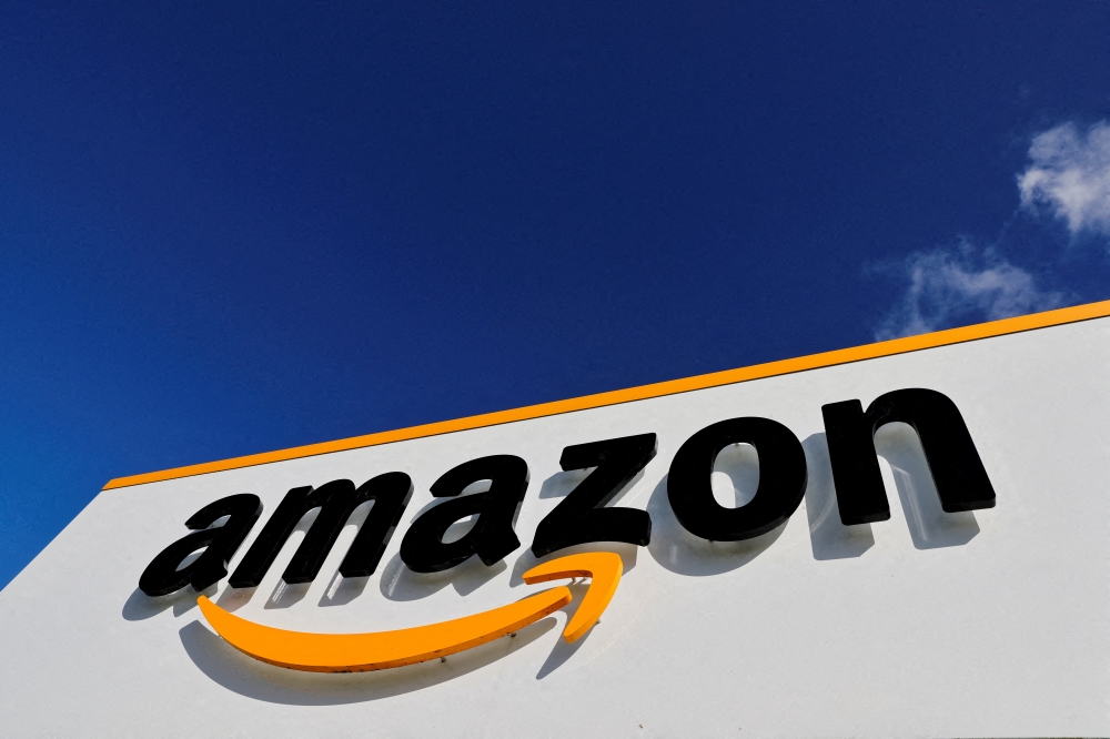 The Amazon logo is seen at the company's logistics centre in Boves, France, October 6, 2021 REUTERS/Pascal Rossignol/File Photo