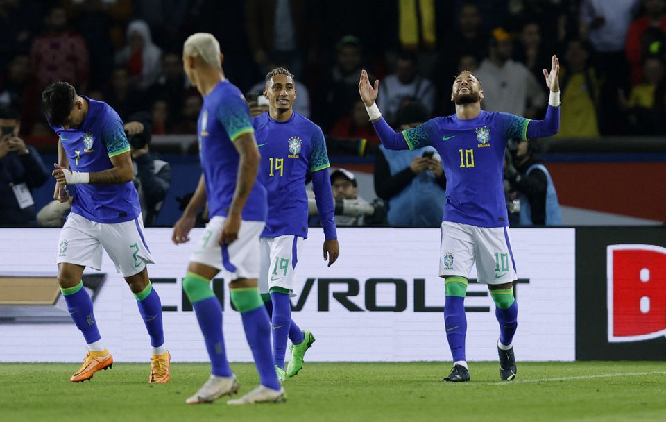 Brazil's Neymar celebrates with his teammates after scoring their third goal during the International Friendly match against Tunisia at the Parc des Princes, Paris, France on September 27, 2022.  REUTERS/Gonzalo Fuentes