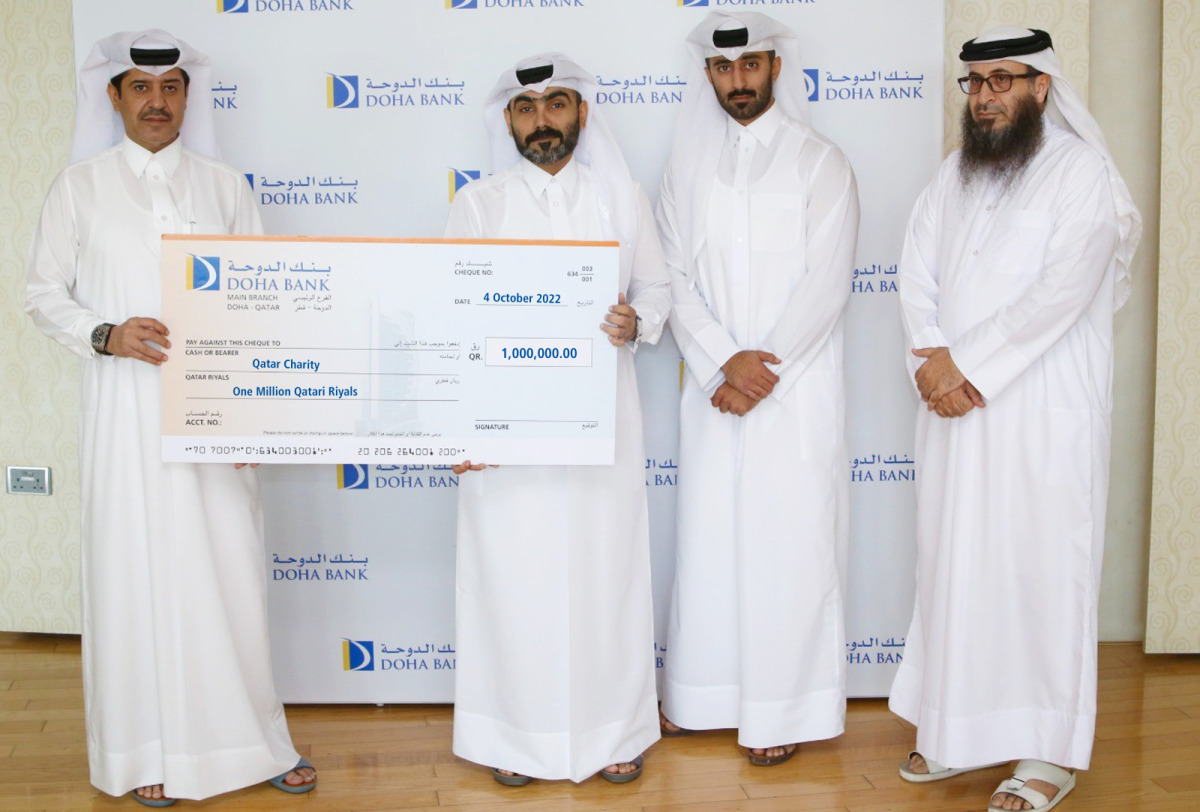 Officials from Doha Bank and Qatar Charity during the awarding of the QR1m donation in Doha, recently.   