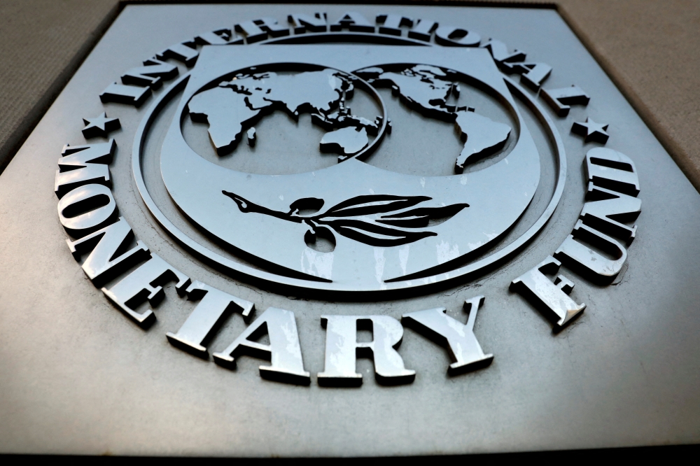 The International Monetary Fund (IMF) logo is seen outside the headquarters building in Washington, US, on September 4, 2018. File Photo / Reuters
