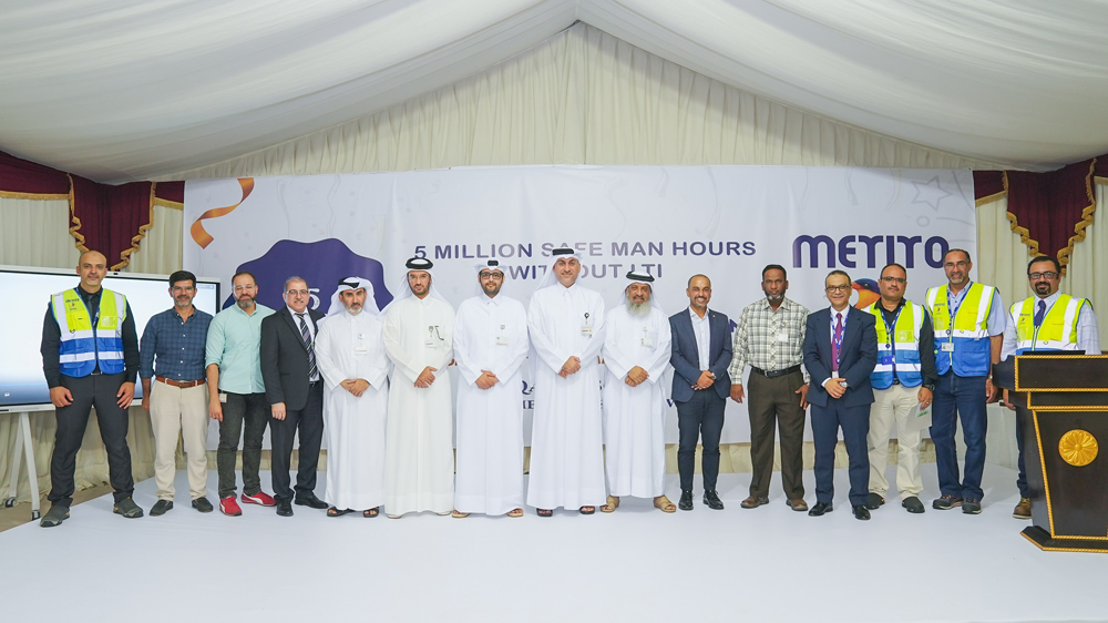 Eng. Khaled Al Obaidly, Manager of Drainage Networks Operation and Maintenance in Ashghal (centre) with Metito-Qatar officials and others during an event appreciating its efforts in maintaining health and safety measures at work sites.