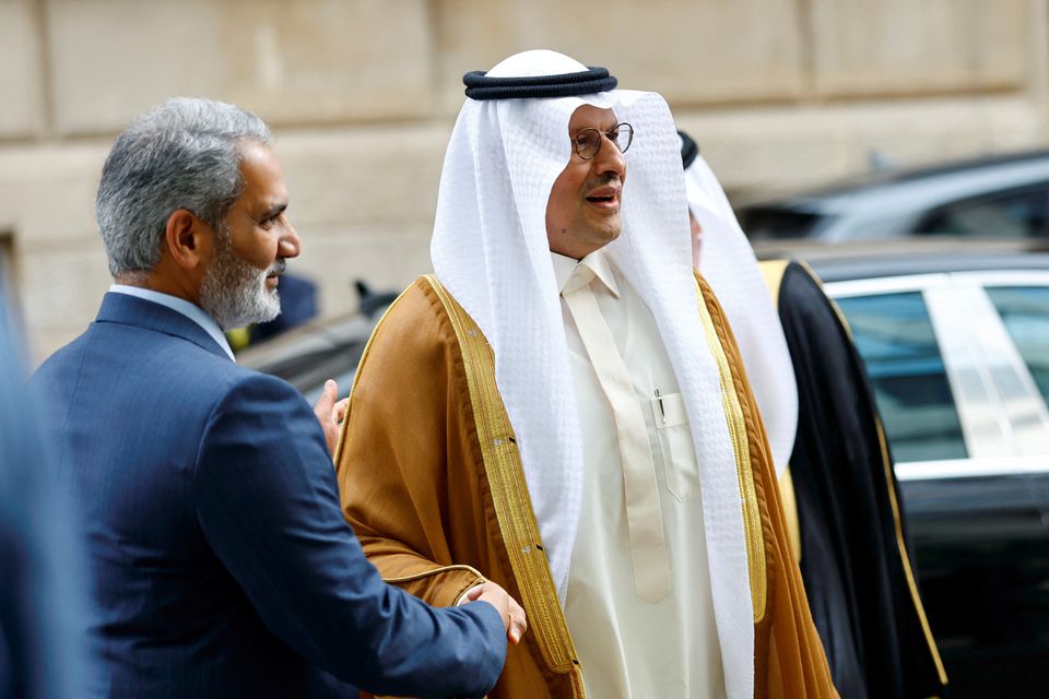 Saudi Arabia's Minister of Energy Prince Abdulaziz bin Salman Al-Saud and OPEC Secretary-General Haitham al-Ghais shake hands at the Organisation of the Petroleum Exporting Countries (OPEC) headquarters in Vienna, Austria, on October 5, 2022.  File Photo / Reuters