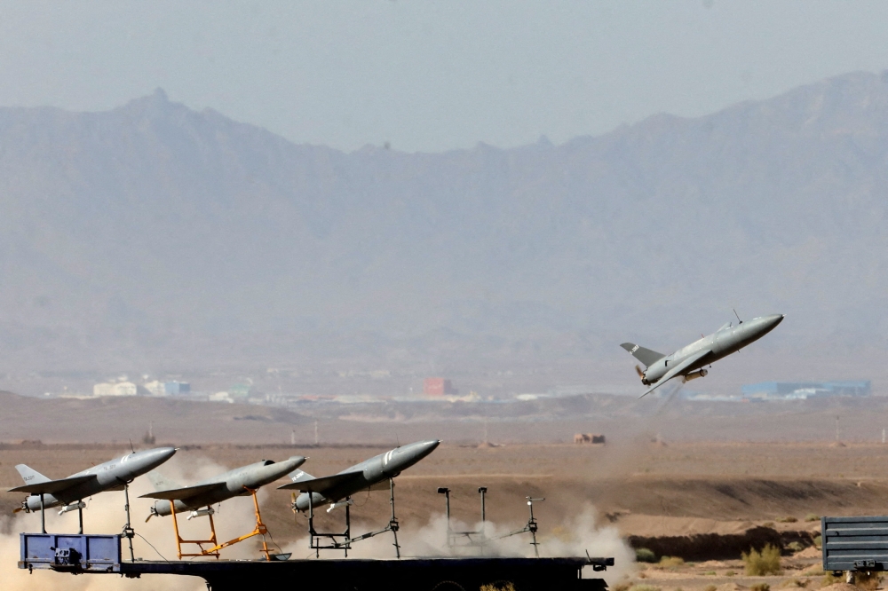 A drone is launched during a military exercise in an undisclosed location in Iran, in this handout image obtained on August 25, 2022. Iranian Army/WANA (West Asia News Agency)/Handout via REUTERS