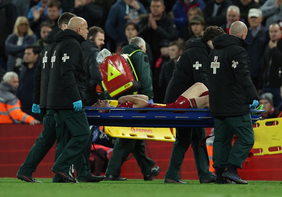 Liverpool's Diogo Jota comes off the pitch in a stretcher after sustaining an injury during the EPL match against Manchester City at Anfield, Liverpool, England, on October 16, 2022.   REUTERS/Phil Noble