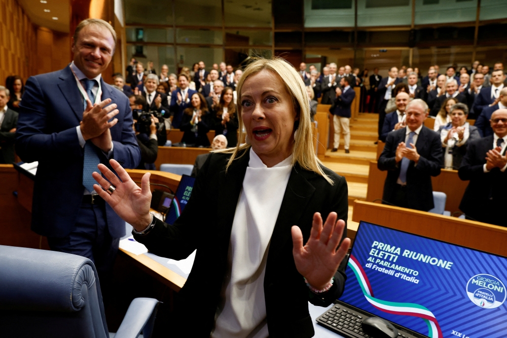 Leader of Brothers of Italy Giorgia Meloni attends meeting with Brothers of Italy newly elected MPs in Rome, Italy, on October 10, 2022. (REUTERS/Guglielmo Mangiapane)