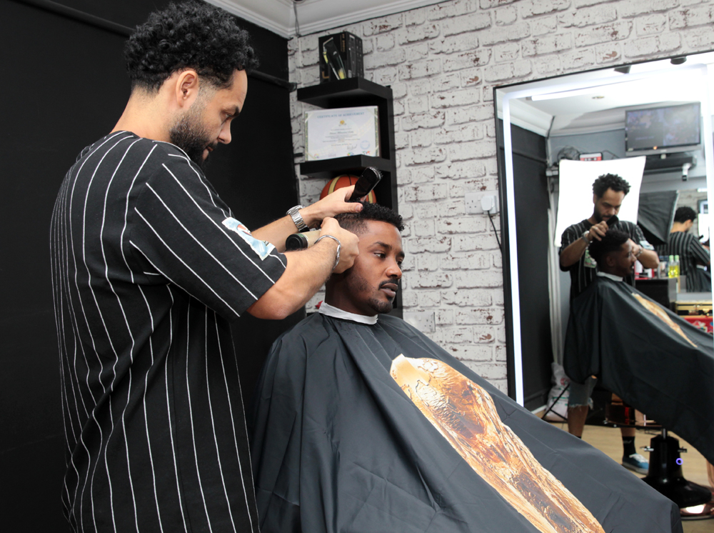 Houssem Sakka styling for Al Sadd Sports Club's Musaab Kheder. Pics: Salim Matramkot/The Peninsula