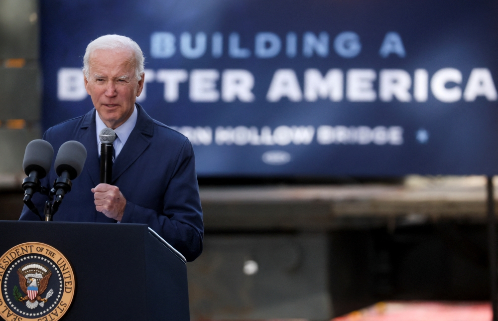 US President Joe Biden delivers remarks from the Fern Hollow Bridge, in Pittsburgh, Pennsylvania, US, on October 20, 2022. REUTERS/Leah Millis
 