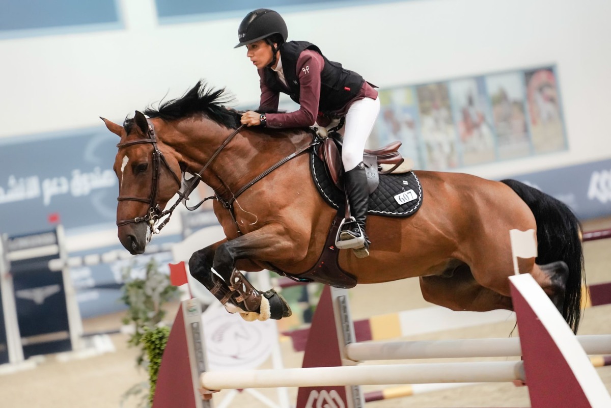 Big Tour winner Cyrine Cherif guides Obama  over a fence.