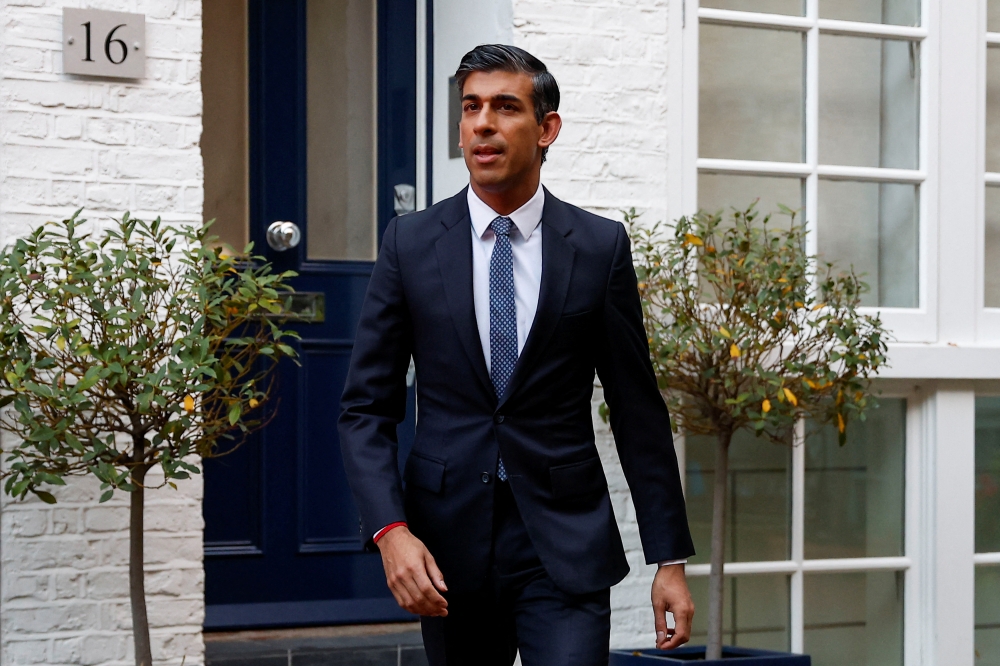 Britain's Conservative MP Rishi Sunak leaves his home address in London, Britain October 24, 2022. REUTERS/Peter Nicholls