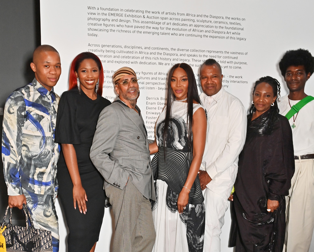 Naomi Campbell (fourth left) with other artistes at the event.