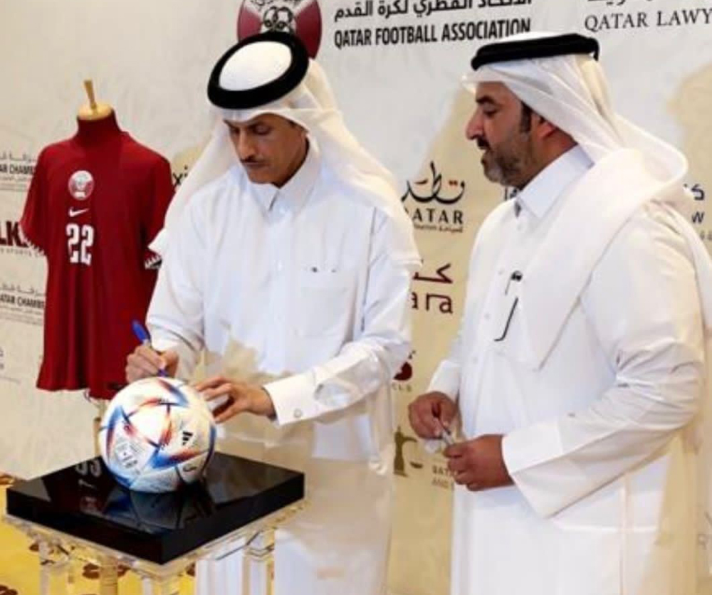 Chairman of the Board of Directors of Dar Al Sharq, Sheikh Dr. Khalid bin Thani Al Thani puts his signature on Al Rihla, the Official Match Ball for the FIFA World Cup Qatar 2022, on the sidelines of International Sports Conference held in Doha yesterday. Pic: Amr Diab