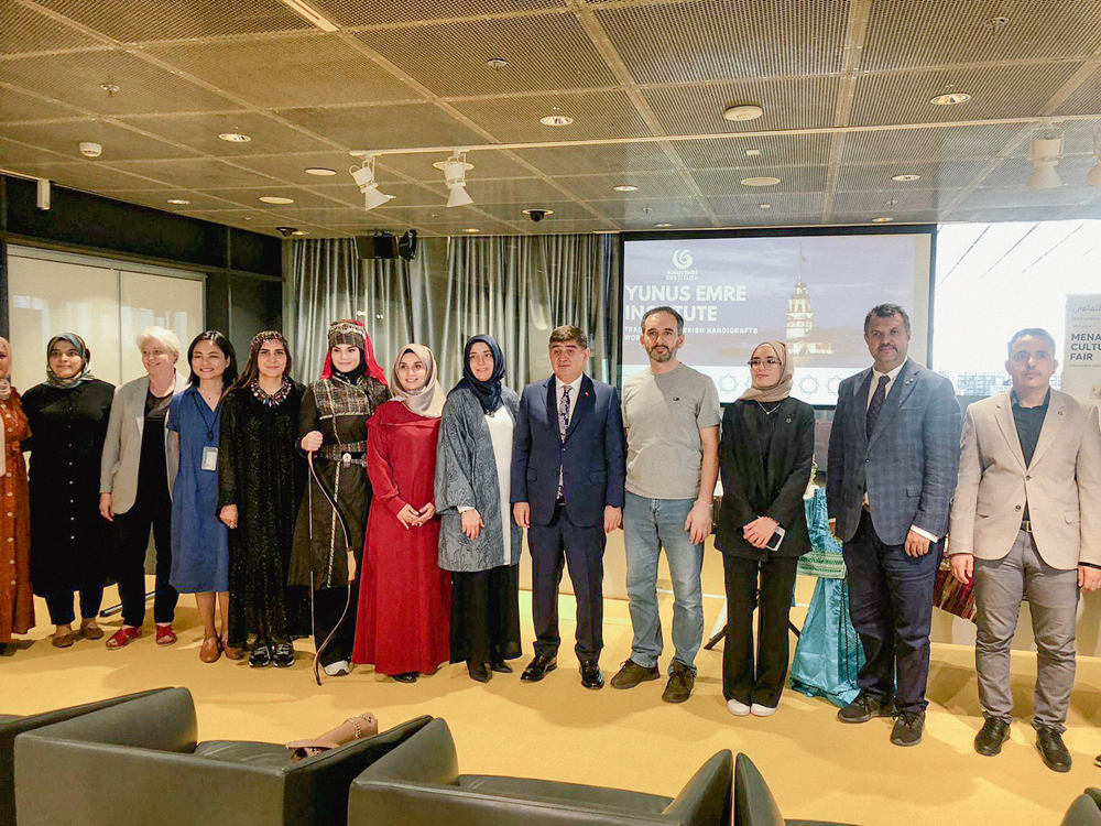 Ambassador of Türkiye to Qatar H E Dr. Mustafa Göksu (fifth right) with guests during the fair.