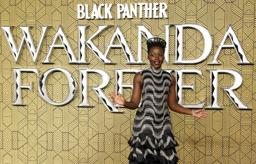 Mexico-born Kenyan actress Lupita Nyong'o poses on the red carpet on arrival to attend the European Premiere of 'Black Panther: Wakanda Forever' in London, on November 3, 2022. (AFP/ISABEL INFANTES)