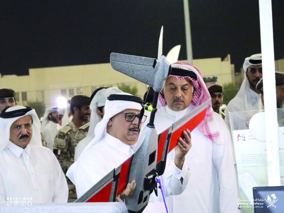 Deputy Prime Minister and Minister of State for Defence Affairs H E Dr. Khalid bin Mohammed Al Attiyah (right) inspecting an exhibit during the event.
