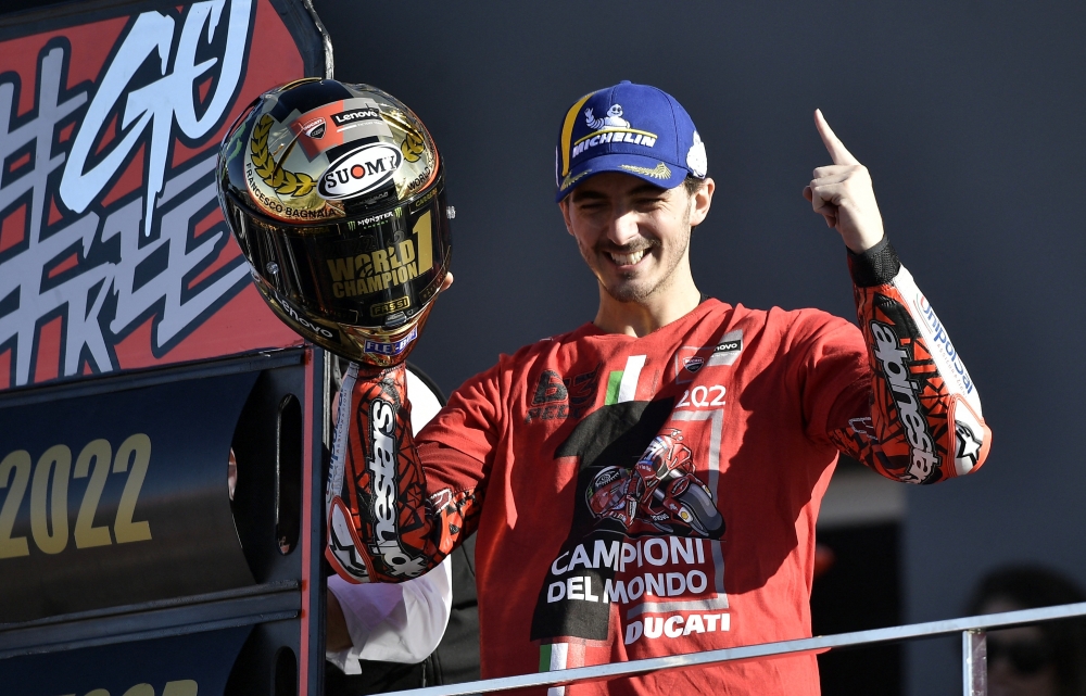 Ducati Lenovo's Francesco Bagnaia celebrates after winning the world championship at the Valencia Grand Prix at Circuit Ricardo Tormo, Valencia, Spain, on November 6, 2022. 
REUTERS/Pablo Morano