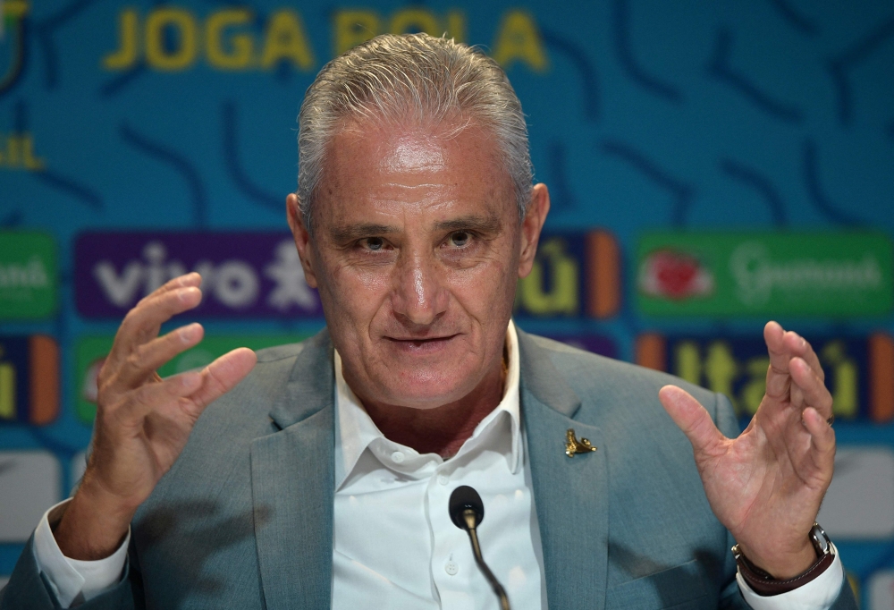 Brazil's coach Tite gestures as he announces the list of players for the upcoming Qatar 2022 World Cup football tournament, at the Brazilian Football Confederation (CBF) headquarters in Rio de Janeiro, Brazil, on November 7, 2022. (Photo by Carl DE SOUZA / AFP)