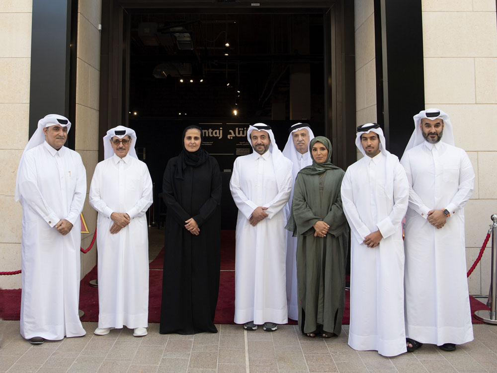 Chairperson of DFI H E Sheikha Al Mayassa bint Hamad bin Khalifa Al Thani (third left); Qatar Media Corporation CEO H E Sheikh Abdulaziz bin Thani Al Thani (fourth left); State Minister and QNL President H E Dr. Hamad bin Abdulaziz Al Kawari (second left); and other officials at the opening of Intaj exhibition.