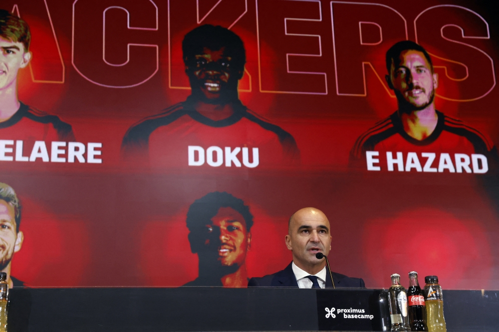 Head coach Roberto Martinez speaks during a press conference to present the squad of Belgium's national football team for the upcoming FIFA 2022 Qatar World Cup, at the team's Base camp in Tubize, on November 10, 2022. (Photo by JOHN THYS / AFP)
