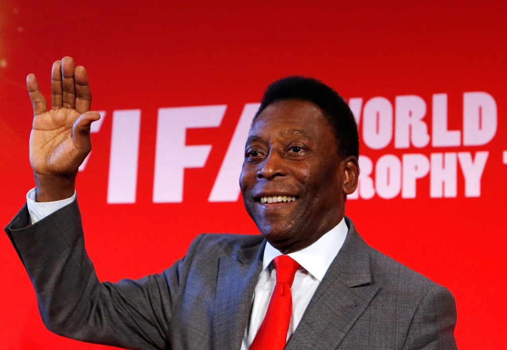 Brazilian soccer great Pele attends a news conference to present the FIFA World Cup global 