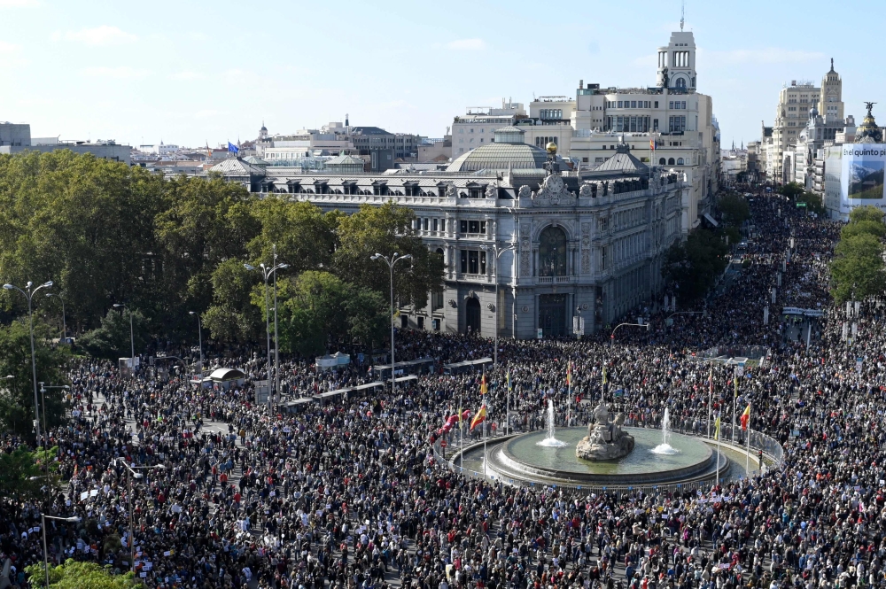 Hundreds of thousands of protesters gather at the Cibeles square during a demonstration called by citizens under the slogan 