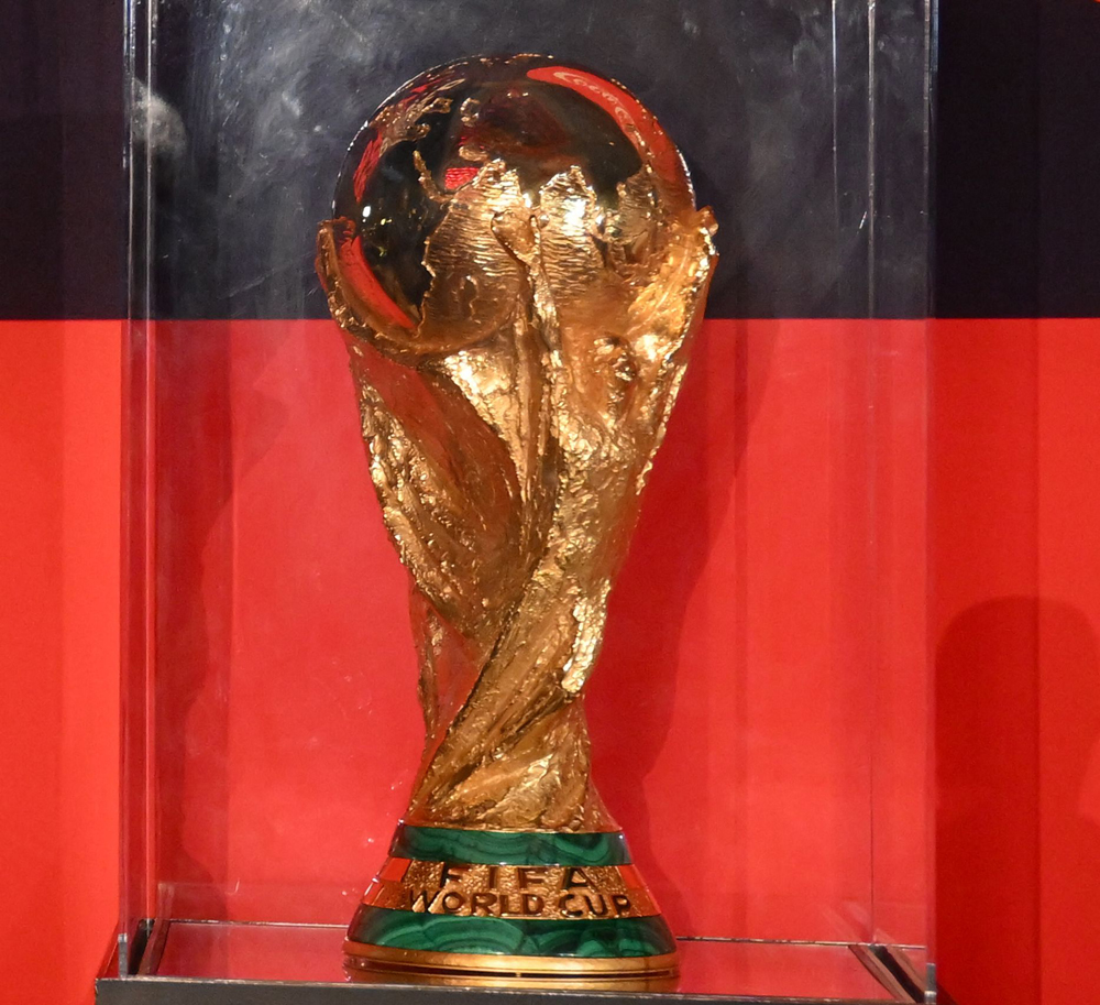 The World Cup trophy is displayed during its arrival back in the country, in Doha, yesterday. (AFP)