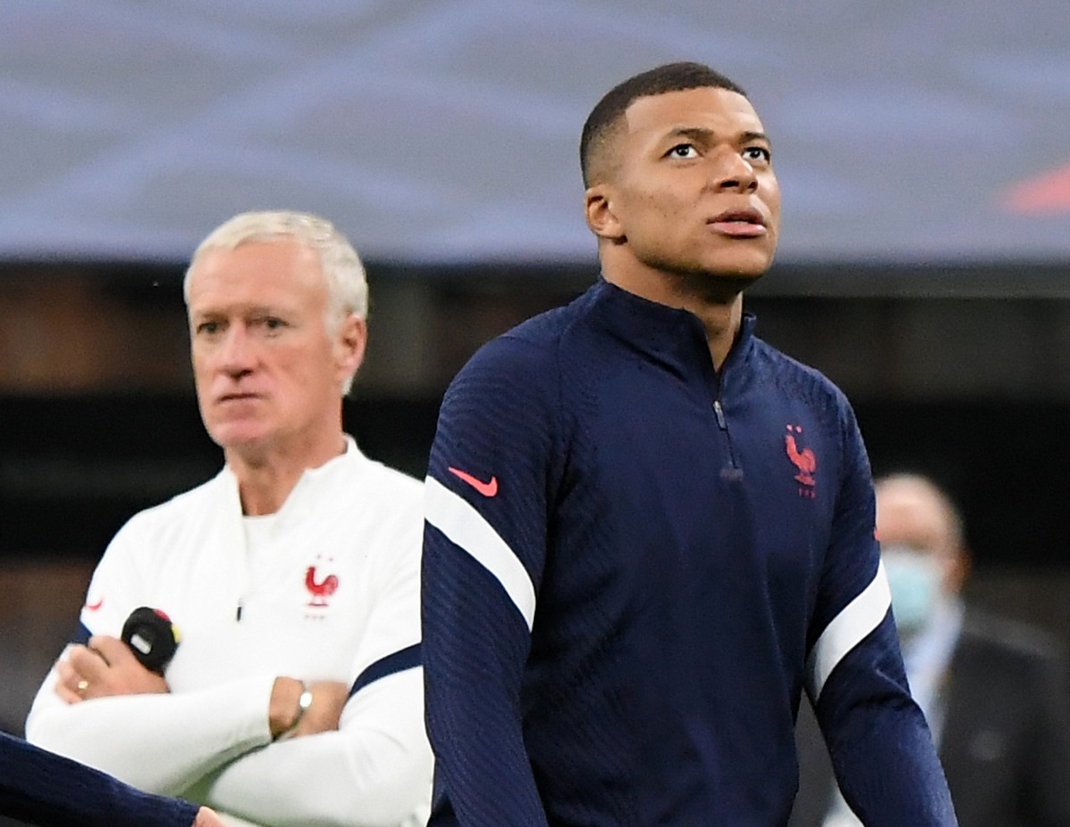 France’s Kylian Mbappe and coach Didier Deschamps during a training session. Reuters