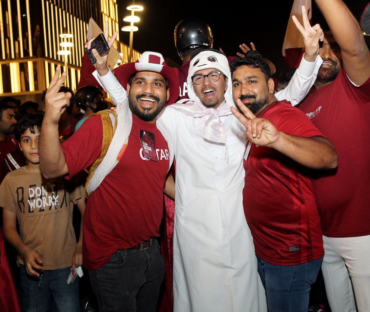 Qatar fans celebrate at Lusail Boulevard. Pictures by: Salim Matramkot/The Peninsula