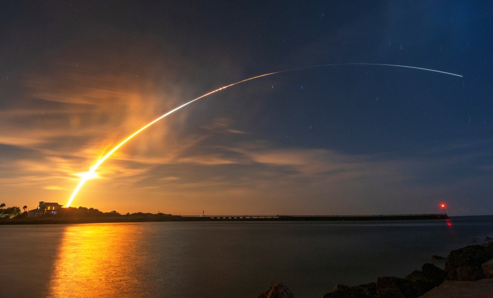 NASA's next-generation moon rocket, the Space Launch System (SLS) rocket with the Orion crew capsule, lifts off from launch complex 39-B on the unmanned Artemis 1 mission to the moon, seen from Sebastian, Florida, U.S. November 16, 2022. Reuters/Joe Rimkus Jr.
