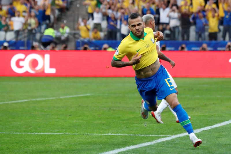 Brazil's Dani Alves celebrates scoring their fourth goal during the Copa America Brazil 2019 match against Peru  at the Arena Corinthians, Sao Paulo, Brazil, on June 22, 2019.  File Photo / Reuters
