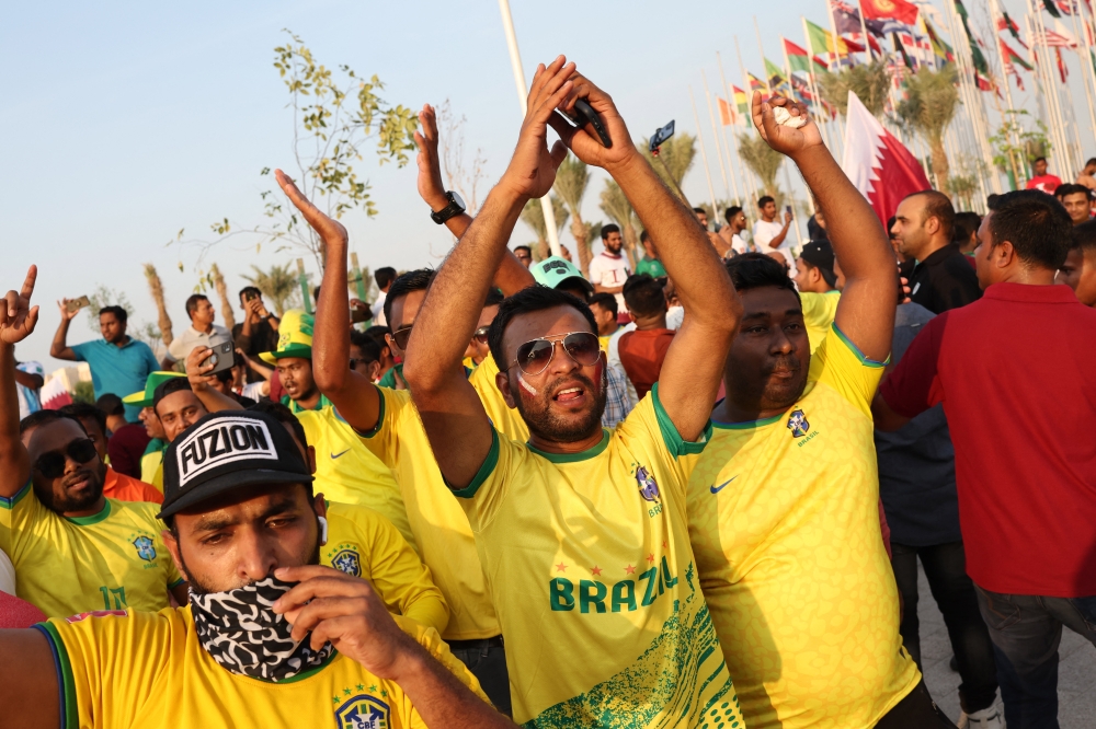 Brazil fans are pictured ahead of the FIFA World Cup Qatar 2022 REUTERS/Marko Djurica