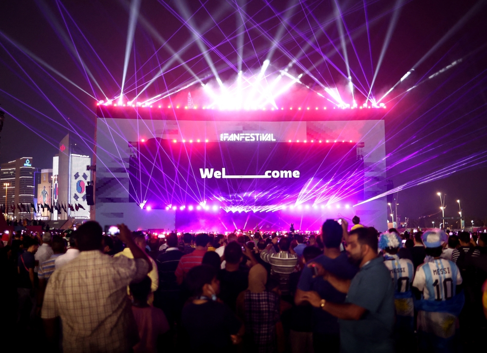 November 19, 2022 General view of fans at a stage during the opening of the FIFA fan festival REUTERS/Marko Djurica