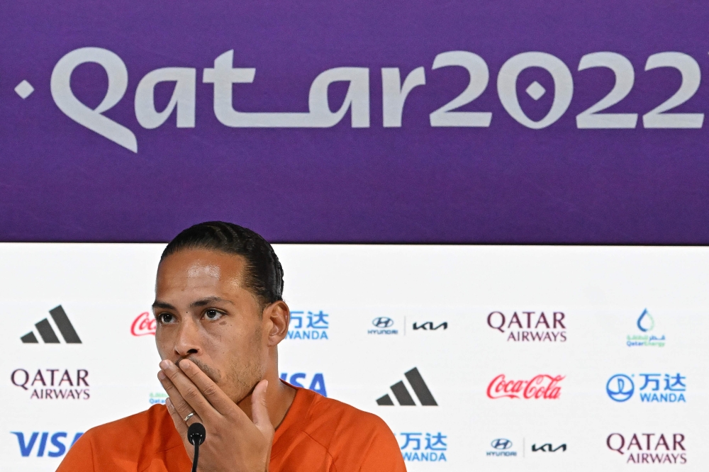 Netherlands' defender Virgil Van Dijk gives a press conference at the Qatar National Convention Centre (QNCC) in Doha on November 20, 2022, on the eve of the Qatar 2022 World Cup football tournament Group A match between Senegal and the Netherlands. (Photo by Alberto PIZZOLI / AFP)
