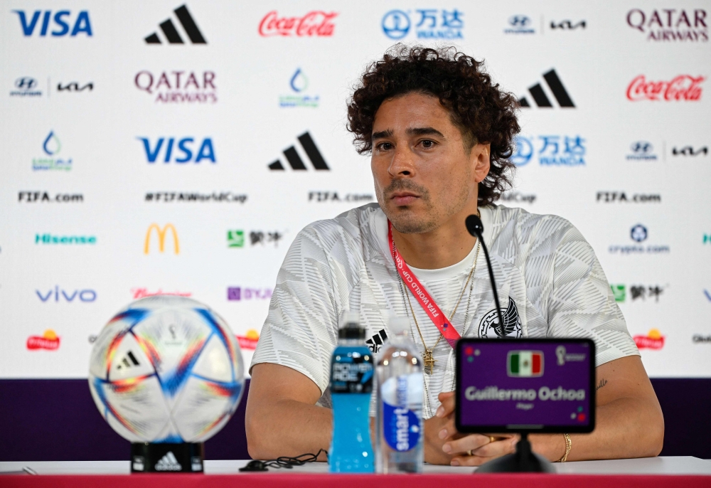 Mexico's goalkeeper Guillermo Ochoa addresses a press conference at the Qatar National Convention Center (QNCC) in Doha, on November 21, 2022, on the eve of the Qatar 2022 World Cup football match between Mexico and Poland. (Photo by Alfredo ESTRELLA / AFP)