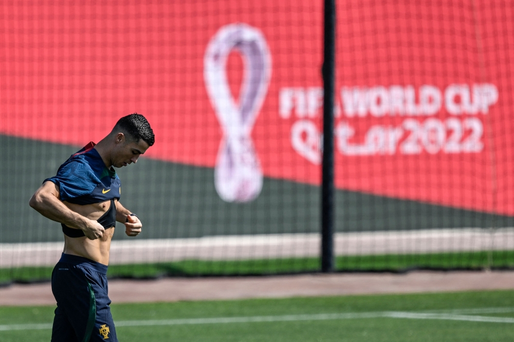 Portugal's forward Cristiano Ronaldo arrives for a training session at Shahaniya Sports Club of Al Samriya Autograph Collection Hotel in Al Samriya, northwest of Doha on November 21, 2022 during the Qatar 2022 World Cup football tournament. (Photo by PATRICIA DE MELO MOREIRA / AFP)