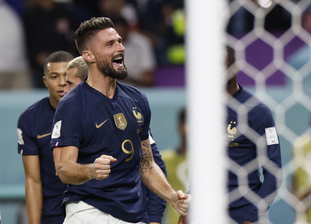 France's Olivier Giroud celebrates scoring their fourth goal during FIFA World Cup Group D match against Australia at the Al Janoub Stadium in Al Wakrah. REUTERS/Issei Kato