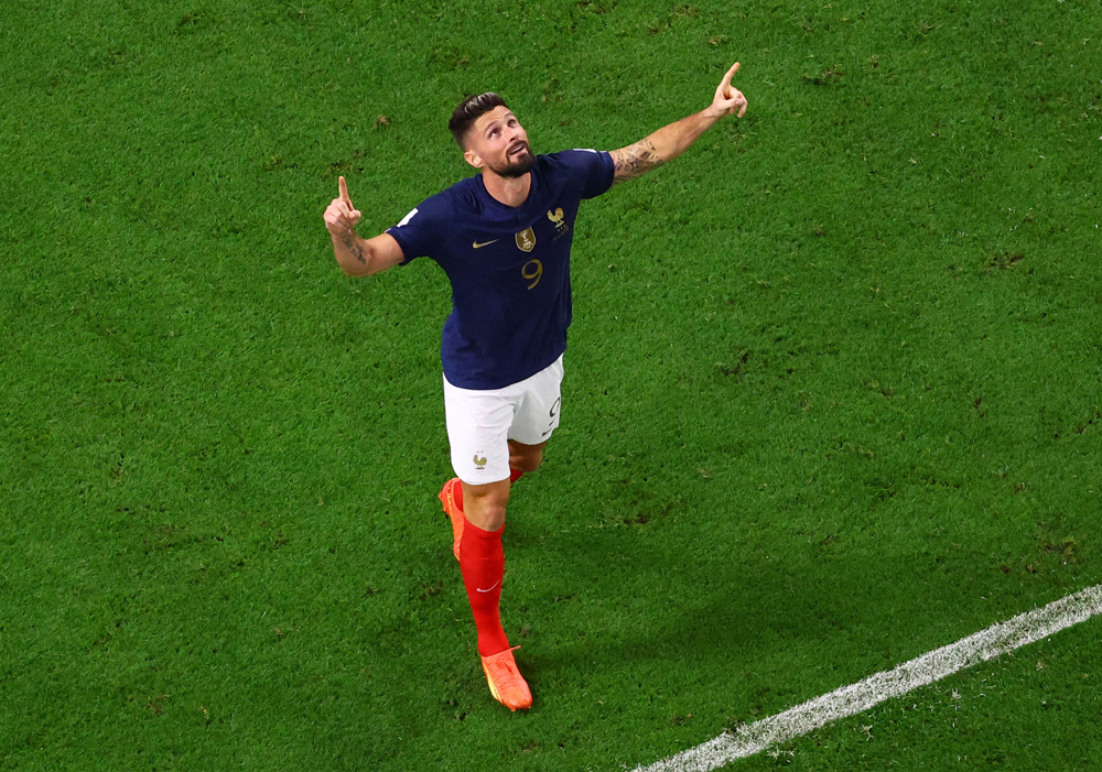 Olivier Giroud celebrates after scoring France's fourth goal. REUTERS