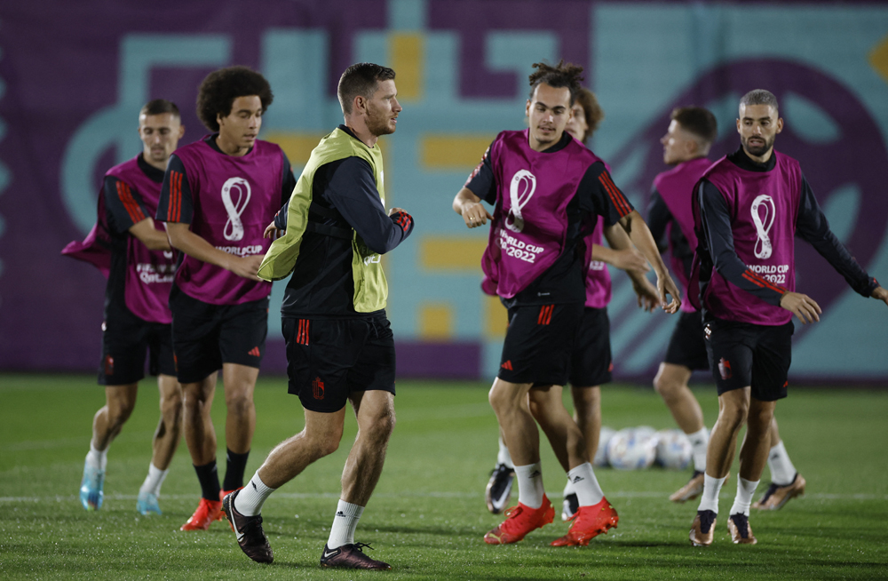 Belgium’s Jan Vertonghen, Axel Witsel, Arthur Theate and Yannick Carrasco with team-mates during a training session, yesterday. REUTERS