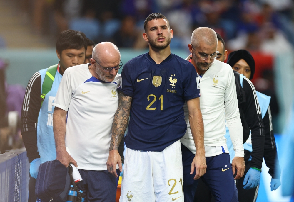 France's Lucas Hernandez reacts after sustaining an injury Reuters/Kai Pfaffenbach