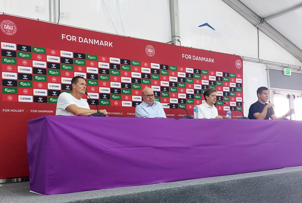 Jesper Moller, chairman of the Danish FA Chairman, CEO of DBU Jakob Jensen and Peter Moller during a press conference at the Al Sailiya SC 2, Al Rayyan, Qatar, on November 23, 2022.  REUTERS/Philip O'Connor