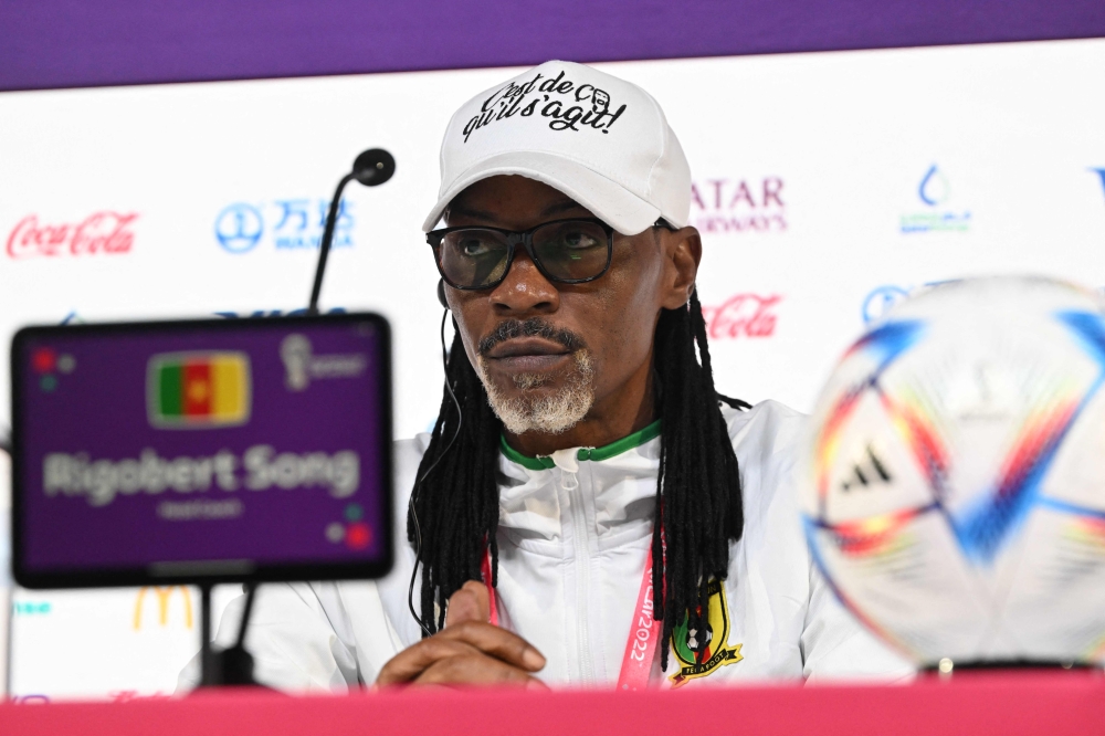 Cameroon's coach Rigobert Song attends a press conference at the Qatar National Convention Center (QNCC) in Doha on November 23, 2022. (Photo by ISSOUF SANOGO / AFP)