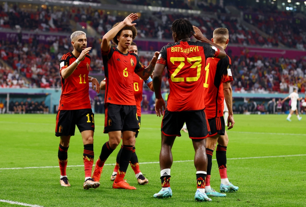 Belgium's Michy Batshuayi celebrates scoring the only goal of the FIFA World Cup Qatar 2022 Group F match against Canada with teammates at the  Ahmad Bin Ali Stadium, Al Rayyan, Qatar, on November 23, 2022.  REUTERS/Siphiwe Sibeko