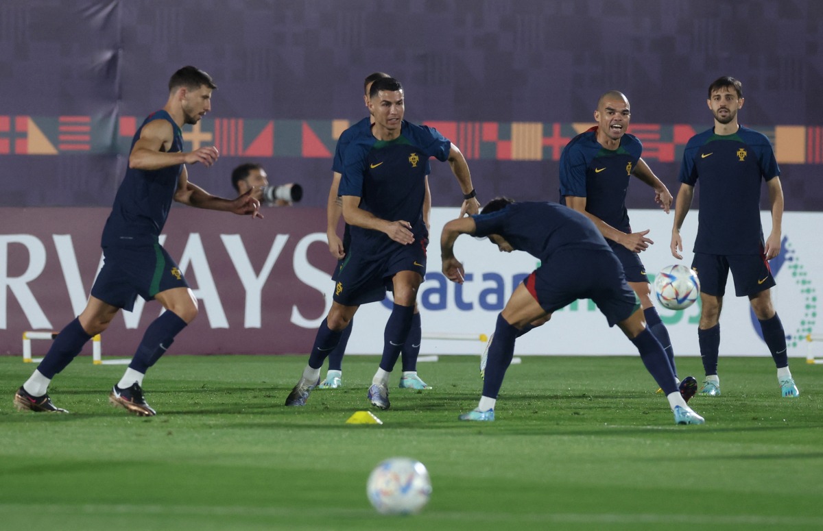 Portugal’s Cristiano Ronaldo and team-mates during a  training session at Al Shahaniya SC Training Facilities yesterday. 