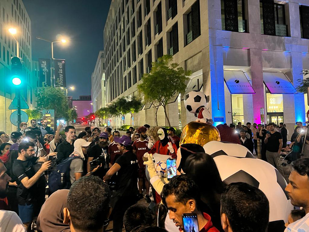 Football fans gather to celebrate FIFA World Cup Qatar 2022 at Msheireb Downton Doha. 