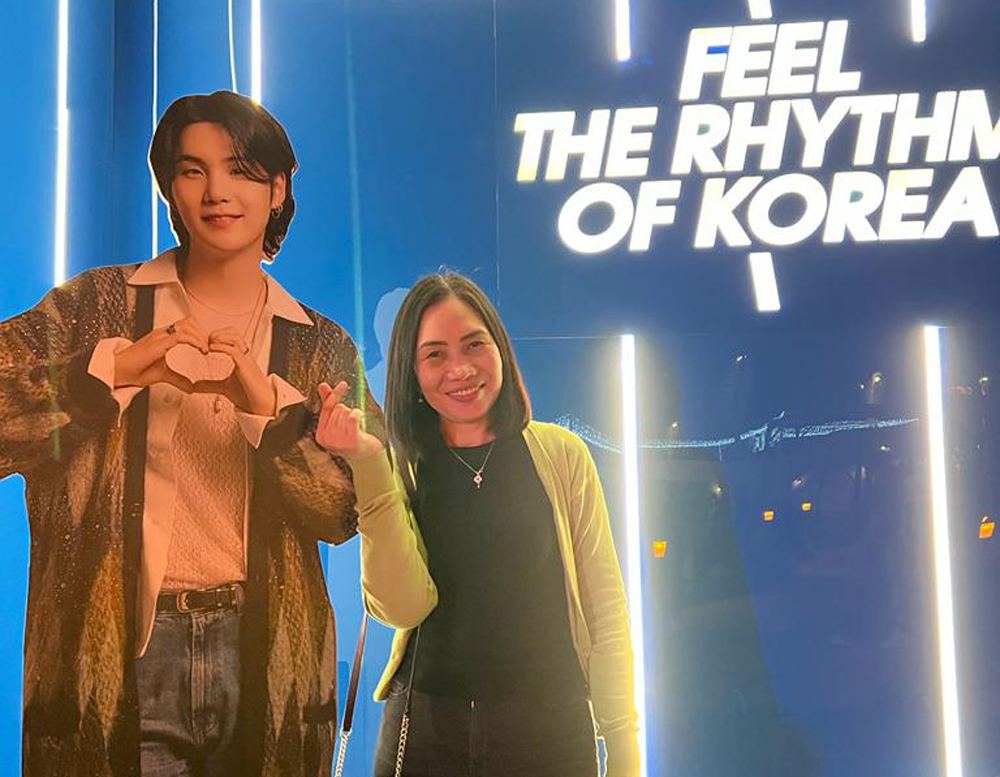 A Korea fanatic, Rohda posing with a life size cutout of BTS’ Suga.