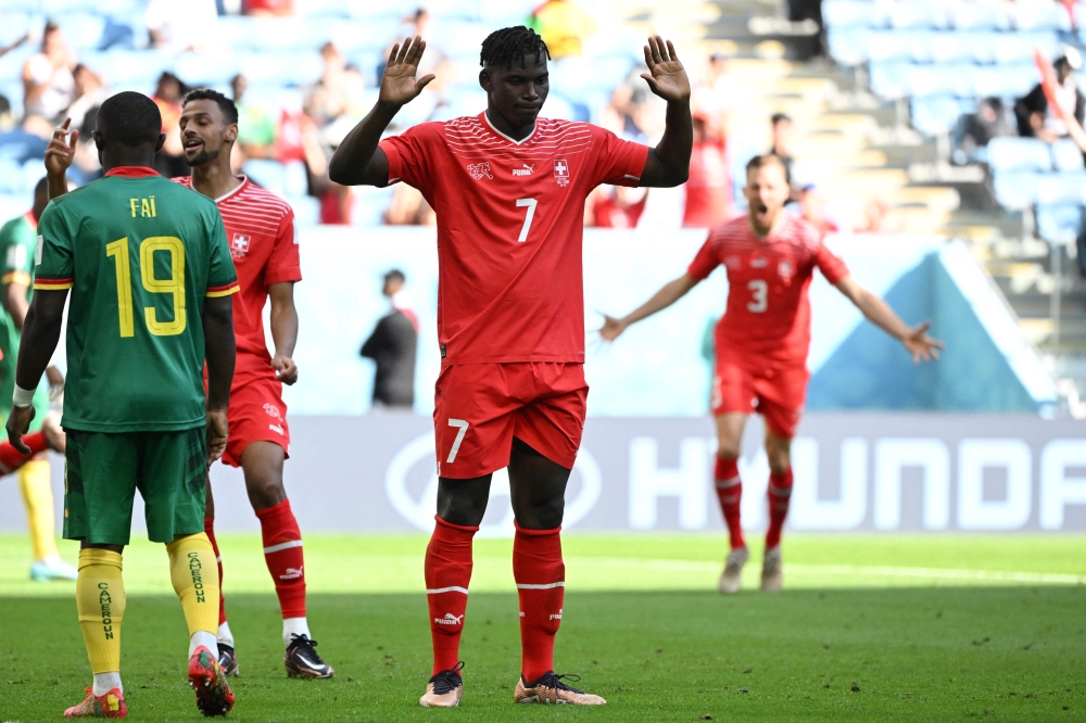 Switzerland's forward #07 Breel Embolo reacts during the Qatar 2022 World Cup Group G football match between Switzerland and Cameroon at the Al-Janoub Stadium in Al-Wakrah, south of Doha on November 24, 2022. Photo by Fabrice Coffrini / AFP