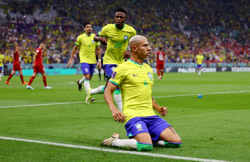 Brazil's Richarlison celebrates scoring their second goal during the FIFA World Cup Qatar 2022 Group G match against Serbia at Lusail Stadium, Lusail, Qatar, on November 24, 2022. REUTERS/Kai Pfaffenbach